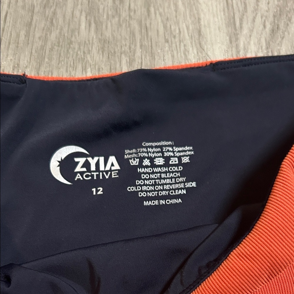Stylish Orange Leggings with Black Trim - Picture 5 of 10